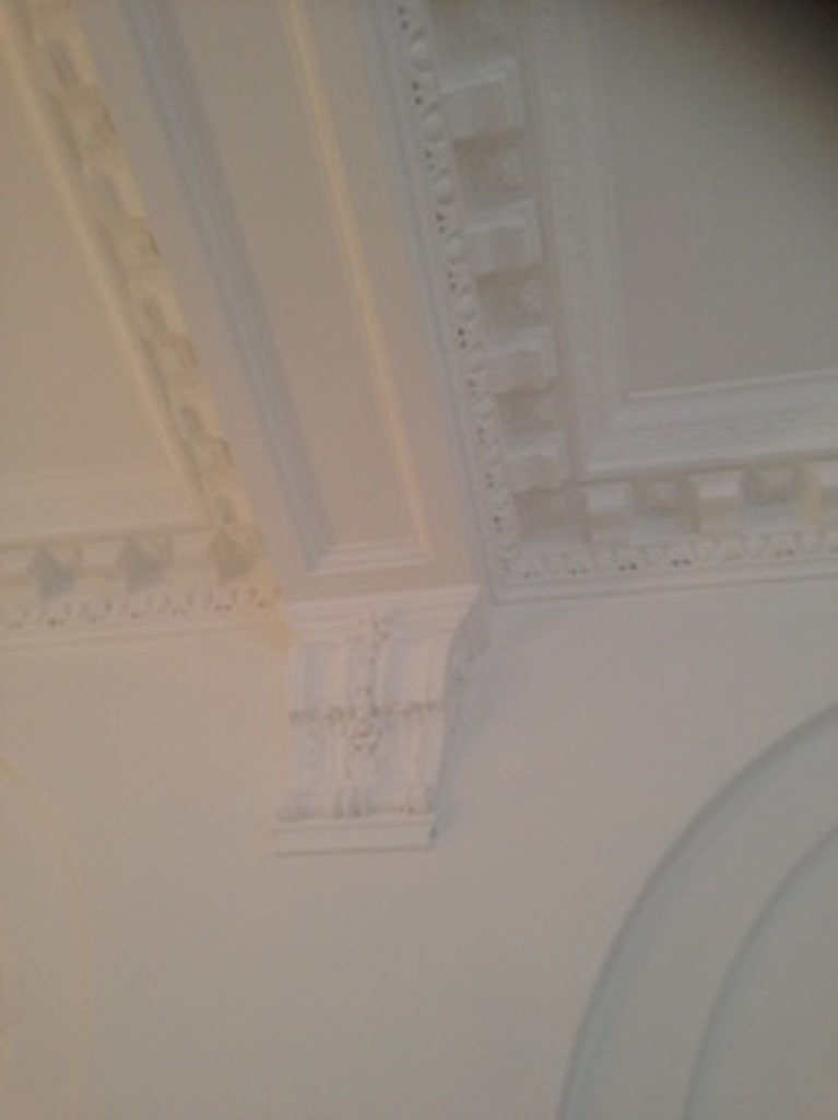 Cornice painting finished, old bank conversion