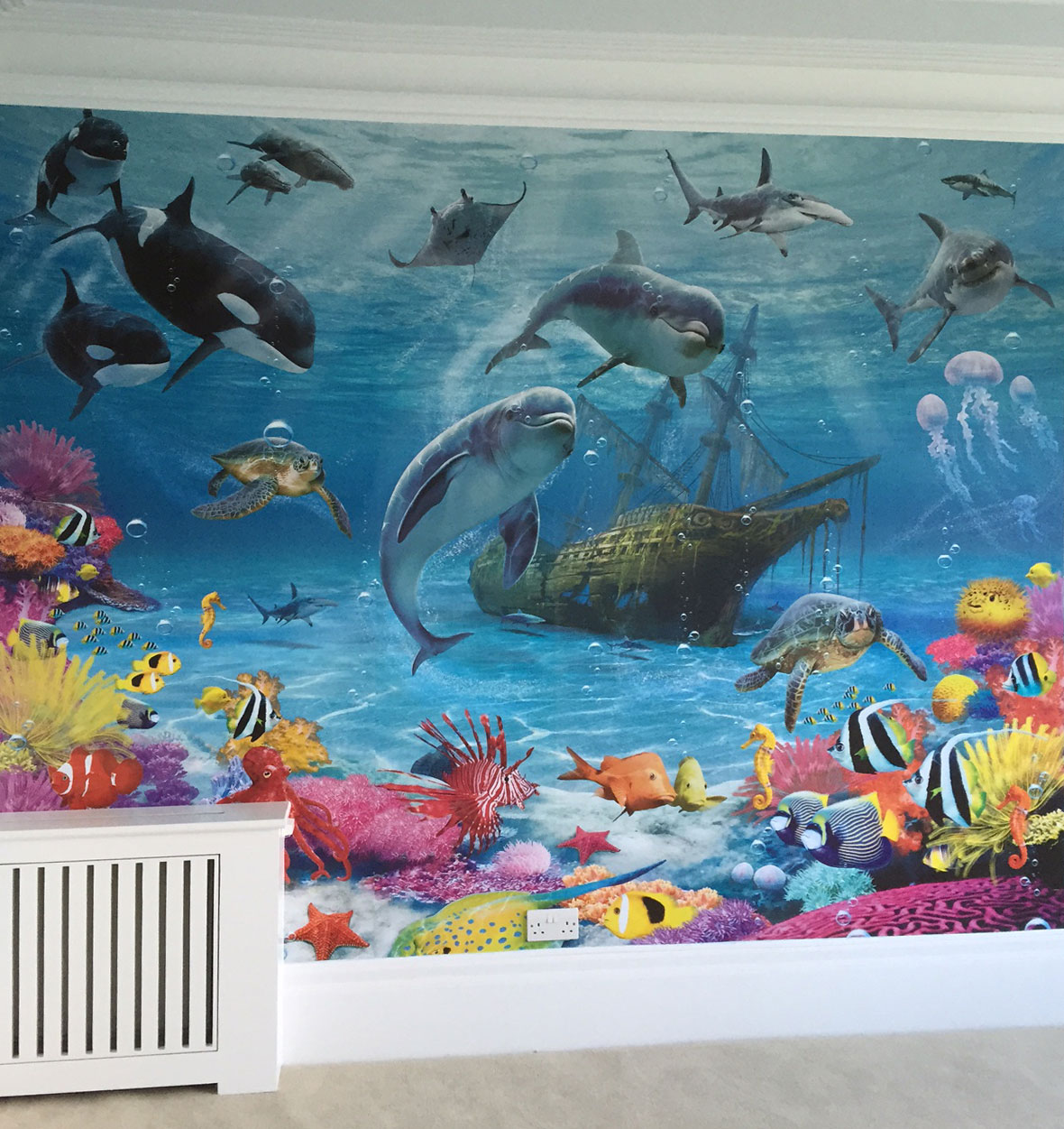 Feature wallpapering in children's bedroom