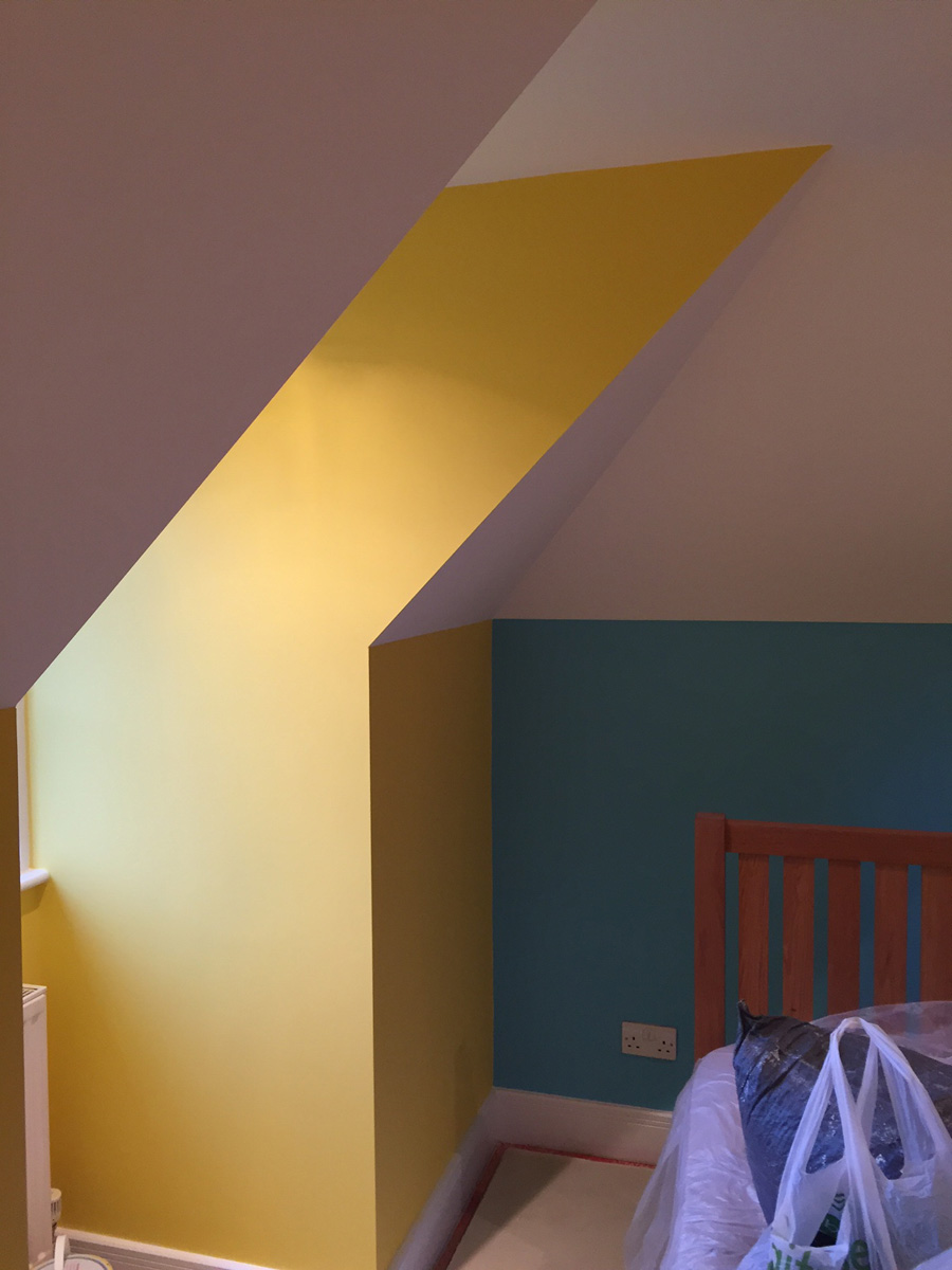 Loft conversion painting showing detail of window
